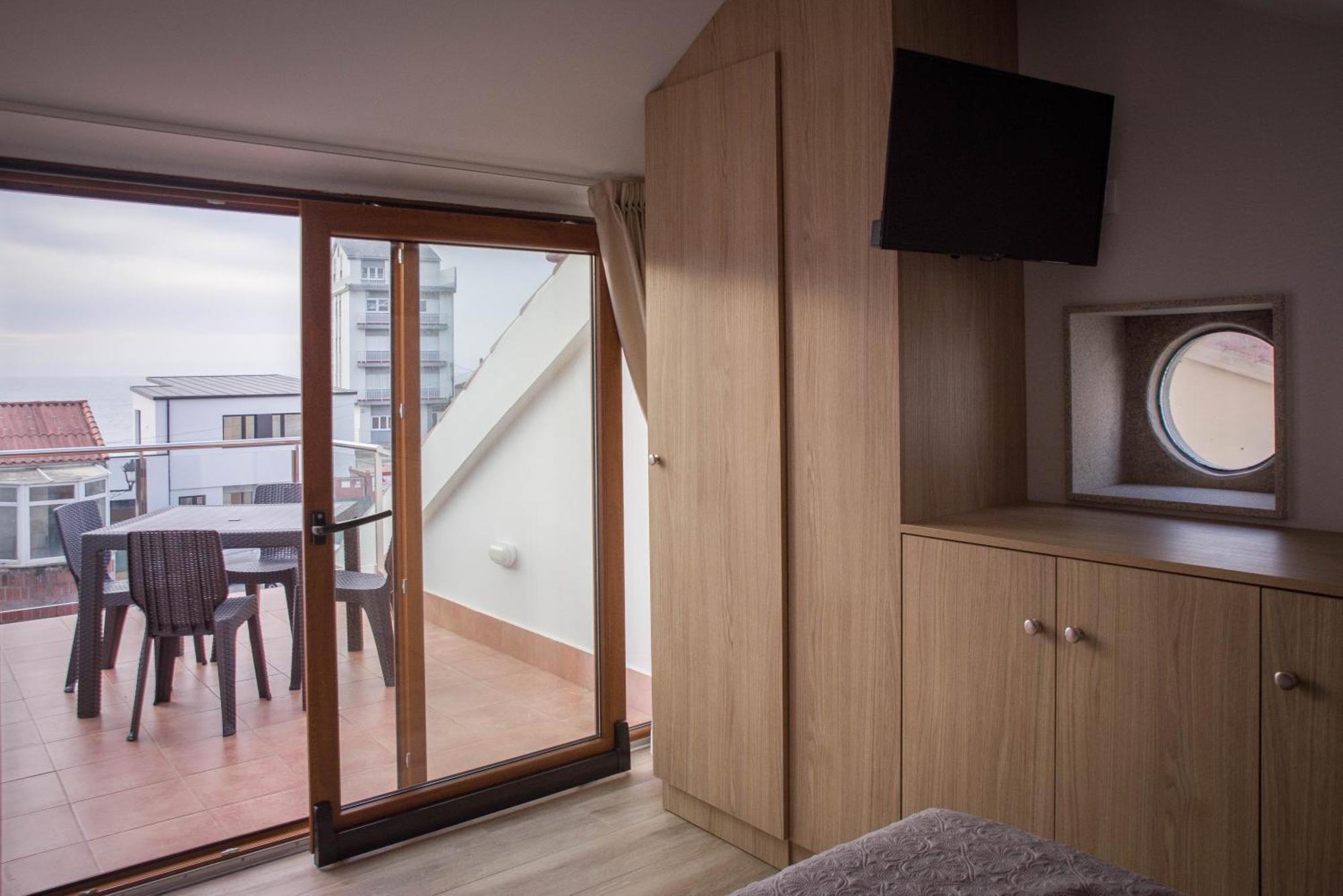 Apartamentos turisticos HAZ AMIGO Muxía Habitación foto