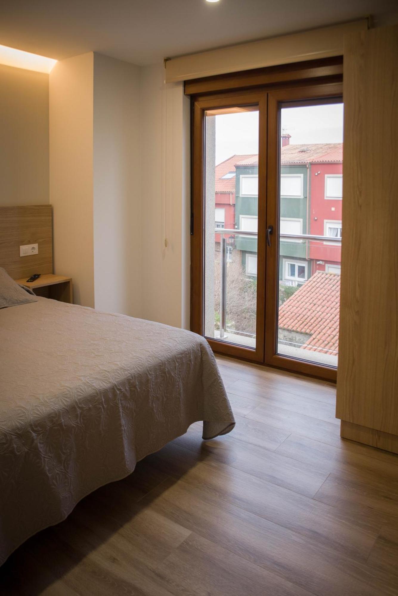 Apartamentos turisticos HAZ AMIGO Muxía Habitación foto